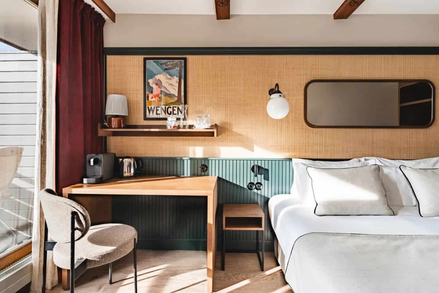 Standard or classic room at Braunbär Hotel in Wengen with modern wood design and alpine art.